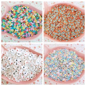 May include: Four bowls filled with colorful polymer clay sprinkles. The sprinkles are shaped like smiley faces, rainbows, playing cards, and flowers.