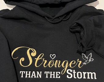 Stronger than the Storm embroidered hoodie
