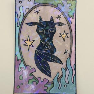 Pegatinas holográficas troqueladas de vinilo resistentes al agua para botellas de agua y portátiles con la carta del tarot de Capricornio
