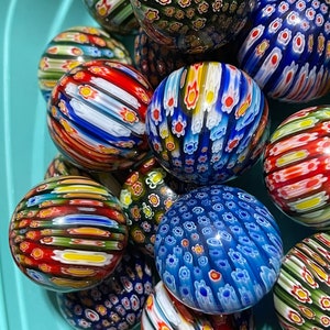 Beautiful Glass Spheres And Hearts With Flower Patterns