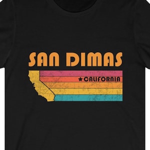 May include: Black t-shirt with a vintage-style graphic of the state of California with the text "SAN DIMAS" and "CALIFORNIA" in orange.