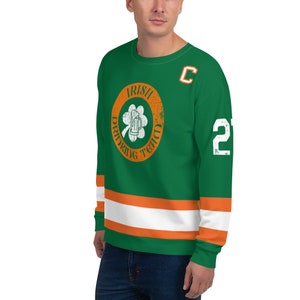 May include: Green and orange sweatshirt with a white stripe across the chest and a white stripe across the sleeves. The sweatshirt has a circular logo with the text "Irish Drinking Team" and a shamrock with a beer mug inside. The sweatshirt also has a "C" on the right shoulder and the number "2" on the right sleeve.