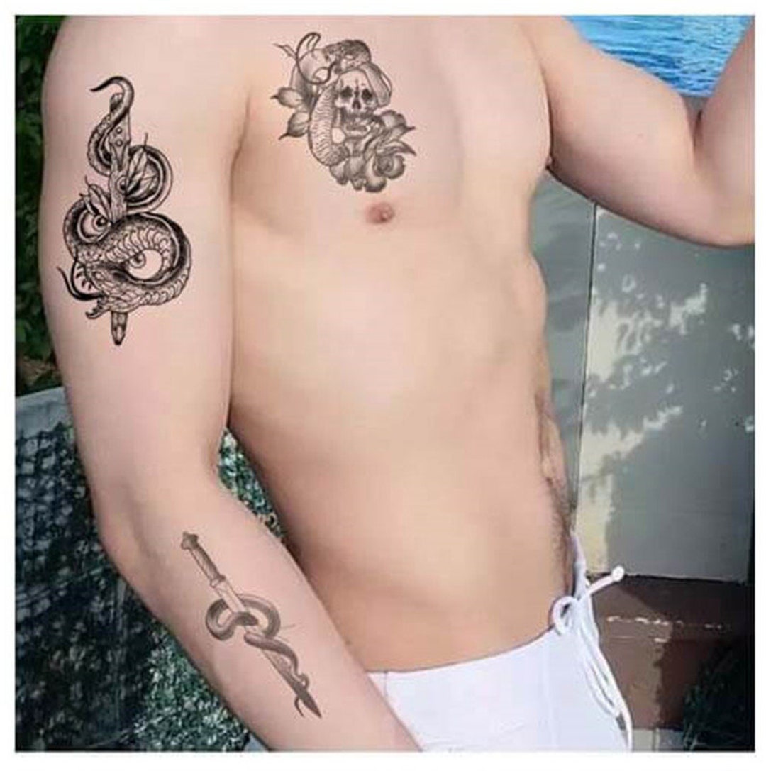 Tatuajes de espadas diseños y significado  Sword tattoo Dragon tattoo  designs Dragon tattoo arm