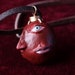 Berserk behelit Necklace Griffith Cosplay Pendant Beherit Guts The egg of king open eyes Version