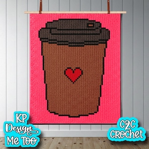 May include: A crochet wall hanging featuring a coffee cup design with a red heart on a pink background. The cup is brown with a dark brown lid. The text "KP Design Me Too" and "C2C Crochet" are visible.