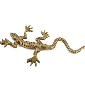 Estatueta de lagarto antigo