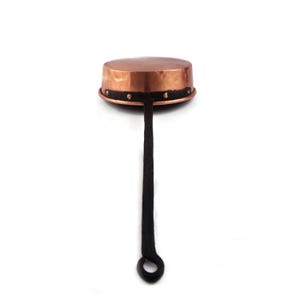 May include: A copper-colored, round cooking pot with a riveted black band and a long, black handle. The handle has a loop at the end. The pot is set against a white background.