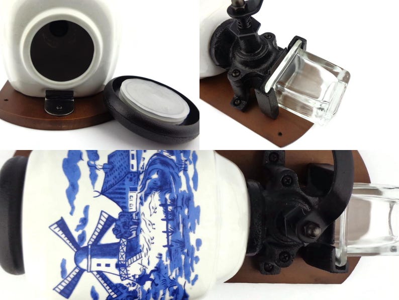 May include: A white ceramic jar with a blue and white windmill design. The jar has a black lid and is attached to a wooden base with a black metal grinder. The grinder has a glass jar for storing spices.