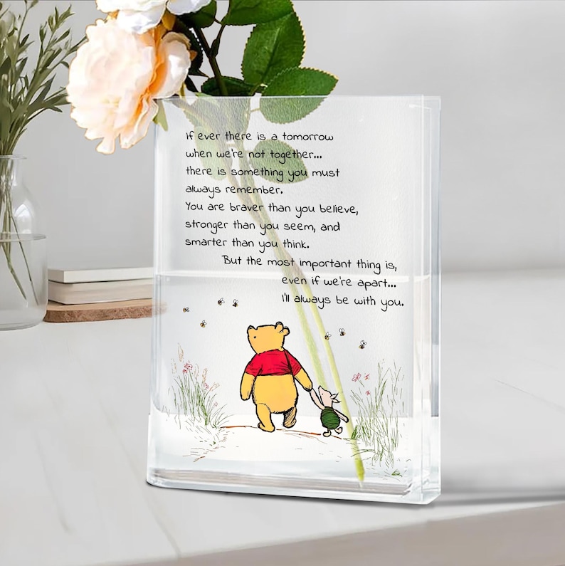 May include: A clear glass vase with a Winnie the Pooh and Piglet illustration. The vase has a quote written on it in black text. The quote reads, "If ever there is a tomorrow when we're not together... I'll always be with you."