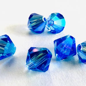 8 mm Swarovski 5301/5328 AB 2X perles de cristal bicones Xilion facettées - (6) pièces, fabrication de bijoux DIY Sapphire AB2X