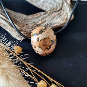 Leopardite, Onkolith, pendant, 23 x 21 x 19 mm, drilled, on leather strap