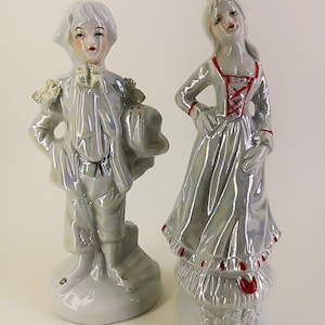 Figurines de dames et de gentleman de porcelaine