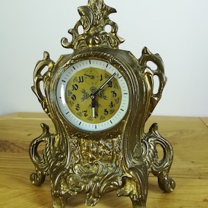 Reloj de latón vintage