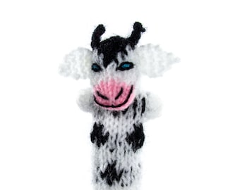 Cow finger puppet theater for playing and learning from wool knitting for kids