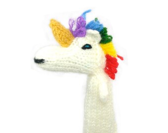 Unicorn finger puppet for playing and learning made of wool knitting for children and babies