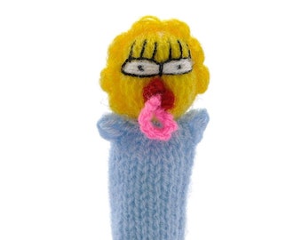 Finger puppet theatre for playing and learning wool knitting for children and babies