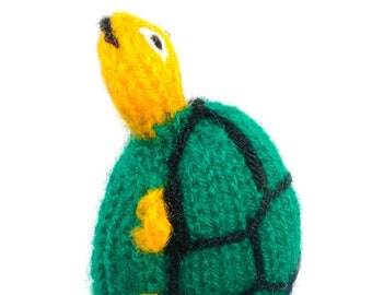 Turtle finger puppet puppet theater for playing and learning from wool knitting for children and babies