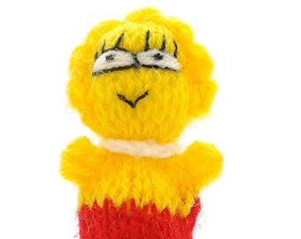 Finger puppet theatre for playing and learning wool knitting for children and babies