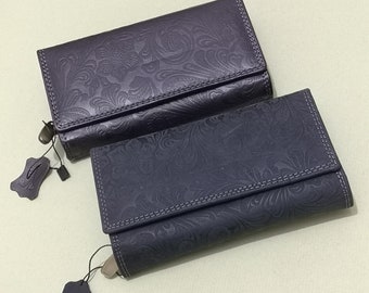 Wallets and purses or purses with RFID protection made of genuine leather. Compact with a lot of special features