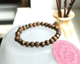 Unisex bracelet made of dark brown African ebony wood beads