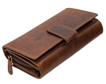 A compact women's wallet with RFID protection made of genuine, ultra-soft leather, featuring numerous card slots. A selection of beautiful colors.