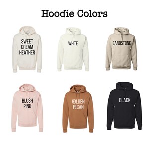 six different colored hoodies, each with a unique color and design, arranged in a grid.