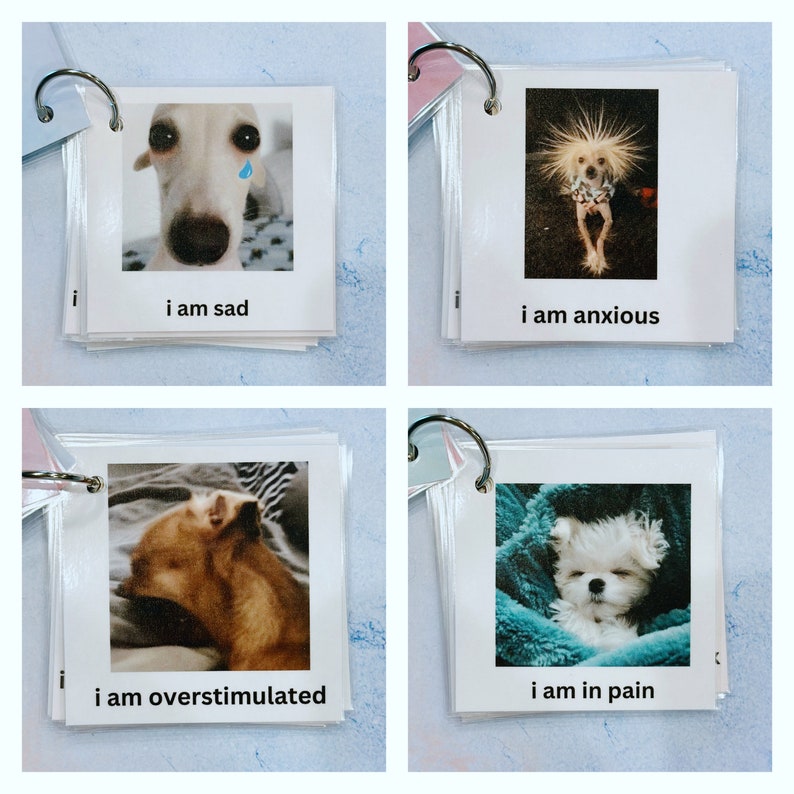 May include: A set of flashcards with images of dogs expressing different emotions. Each card has a photo of a dog and a corresponding text label: "I am sad," "I am anxious," "I am overstimulated," and "I am in pain."