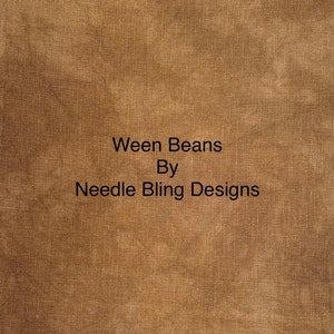 May include: A brown burlap fabric background with the text "Ween Beans By Needle Bling Designs" in black.