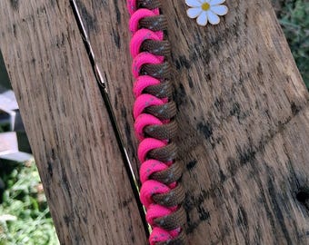 Handmade Pink and Brown Paracord Bag Charm or Keychain with a  Silver Clasp with a White Daisy Flower