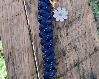 Handmade Dark Blue Paracord Bag Charm with a  Silver Clasp with a White Daisy Charm