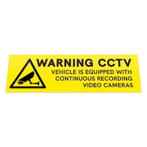 May include: Yellow warning sign with a black triangle and a camera icon. The sign reads "WARNING CCTV VEHICLE IS EQUIPPED WITH CONTINUOUS RECORDING VIDEO CAMERAS".