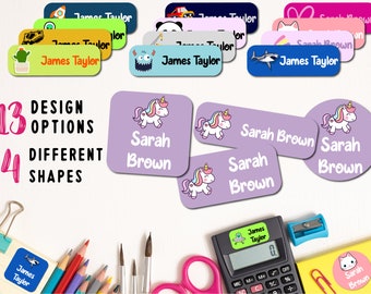 May include: A set of 13 personalized name labels with 4 different shapes. The labels feature various designs including a unicorn, a shark, a spaceship, a monster, a panda, a cactus, and a cat. The text on the labels reads "James Taylor" and "Sarah Brown".