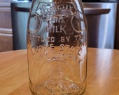 Dairying Empire State Dairy Company Brooklyn, NY Lockport Glass Co Circa 1915 One Quart Round Embossed Milk Bottle Strictly Pure Milk