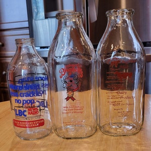 Dairying/ Unigate Dairy/ Broguiere&#39;s Farm/ McLaughlin Dairy/ 1980-1994/ Three Glass Pyroglazed Quart & Imperial Pint Milk Bottles