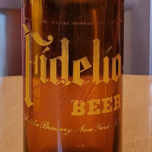 Vintage/ ACL Fidelio Beer Amber Glass Crown Top Bottle/ Owens-Illinois Glass Co./ 1933/ Fidelio Brewery/ New York, N.Y,/ Two-Tone ACL Bottle