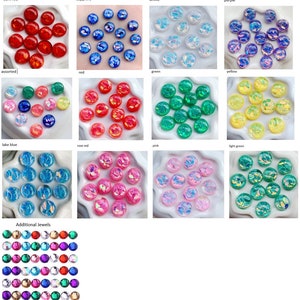 May include: Assortment of iridescent round cabochons in various colors, including dark red, sapphire, white, purple, assorted, red, green, yellow, lake blue, rose red, pink, and light green. Additional jewels are shown in a separate section.