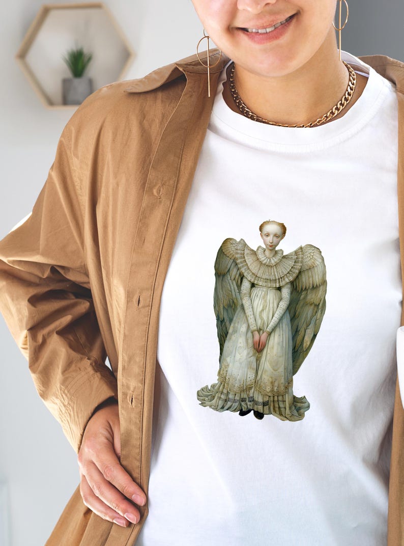 Model wearing a white tee with a large angel transfer, wearable craft example for printable Christmas angel paper dolls DIY