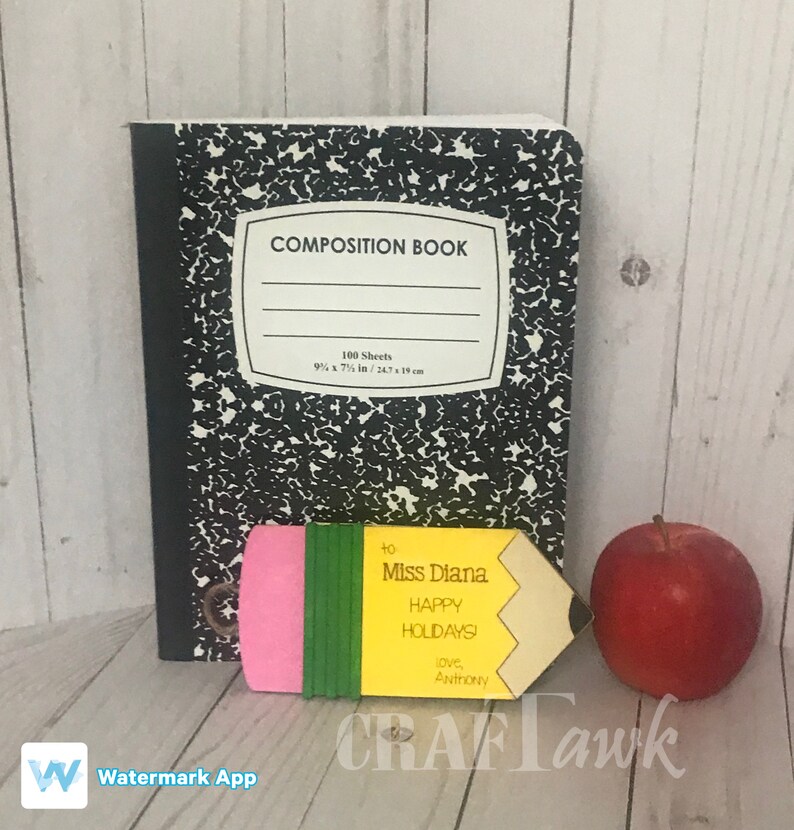 May include: A yellow pencil-shaped card with a pink eraser and green stripes. The card says "to Miss Diana Happy Holidays! love, Anthony".