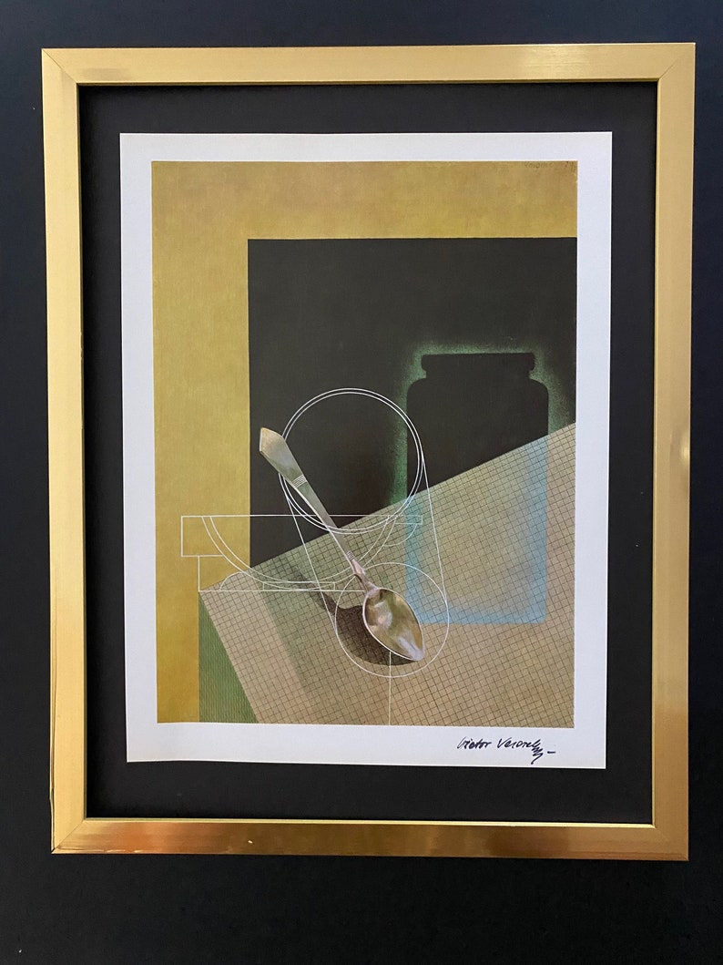 May include: A framed print of a still life featuring a silver spoon, a glass jar, and a bowl on a checkered tablecloth. The background is a dark green and gold color. The print is signed "Peter Verschoyle".