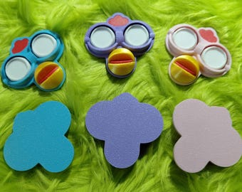 Pastel Furby faces, 3D printed.