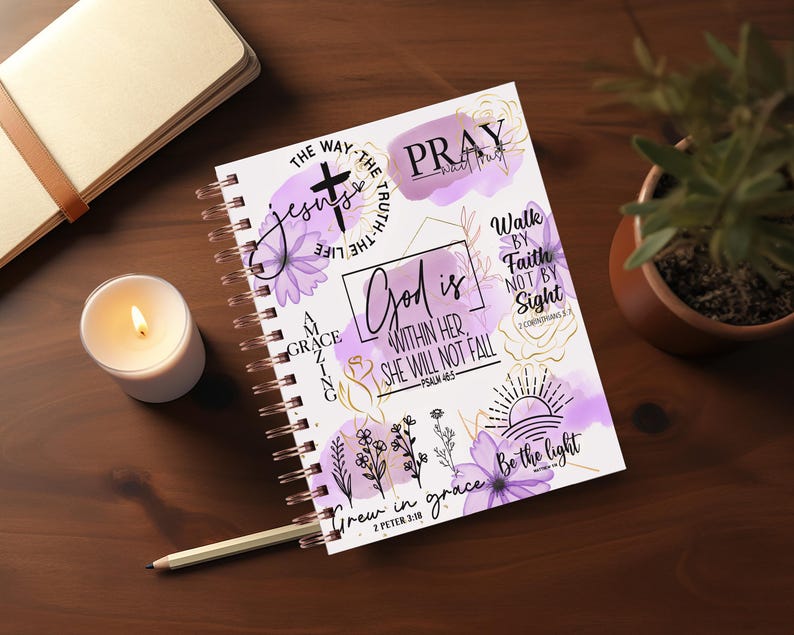 May include: A purple and gold spiral bound journal with inspirational quotes and bible verses. The cover features a cross, flowers, and the words "God is within her, she will not fall" and "Grew in grace".