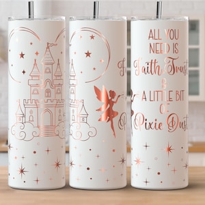 May include: White insulated tumblers with rose gold castle, fairy, and star designs. One tumbler has the text "All You Need Is Faith, Trust & A Little Bit Of Pixie Dust". Each tumbler has a silver straw.