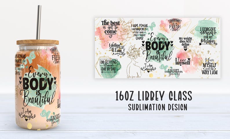 May include: A clear glass Libbey can with a bamboo lid and a stainless steel straw. The glass is decorated with the words "Every Body is Beautiful" and other inspirational phrases in black and gold. A matching design is on a white background.