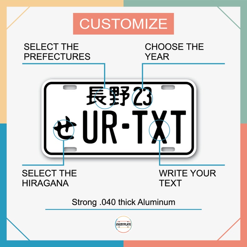 May include: A white Japanese number plate with black text. The text reads "長野23 UR-TXT". The plate is made of aluminium and is 0.040 inches thick.