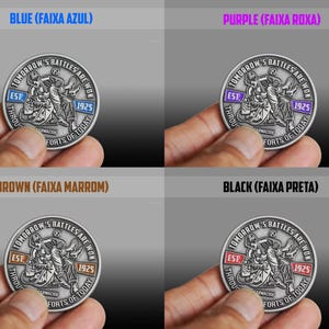 May include: A collection of silver-colored coins, each featuring a detailed illustration of two figures engaged in combat. The coins have text that reads "Tomorrow's Battles Are Won Through Forts of Today" and "Est. 1925". Each coin has a different colored border: blue, purple, brown, and black.