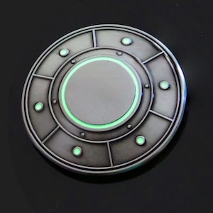 Spinning UFO Challenge Coin that Glows in the Dark - Antique Silver