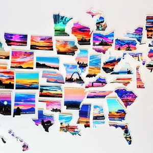 May include: A colourful map of the United States made of individual state stickers. Each state sticker features a scenic sunset landscape with a silhouette of a landmark or natural feature. The stickers are arranged in the shape of the United States.