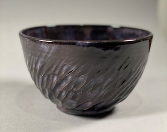 Translucent purple carved bowl