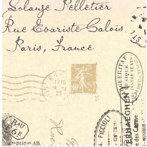 May include: A cream-colored fabric featuring a vintage postal theme with black cursive handwriting that reads Solange Pelletier, Rue Evariste Galois, Paris, France, alongside various dark brown postmarks and stamps, with a 12-inch ruler at the bottom.