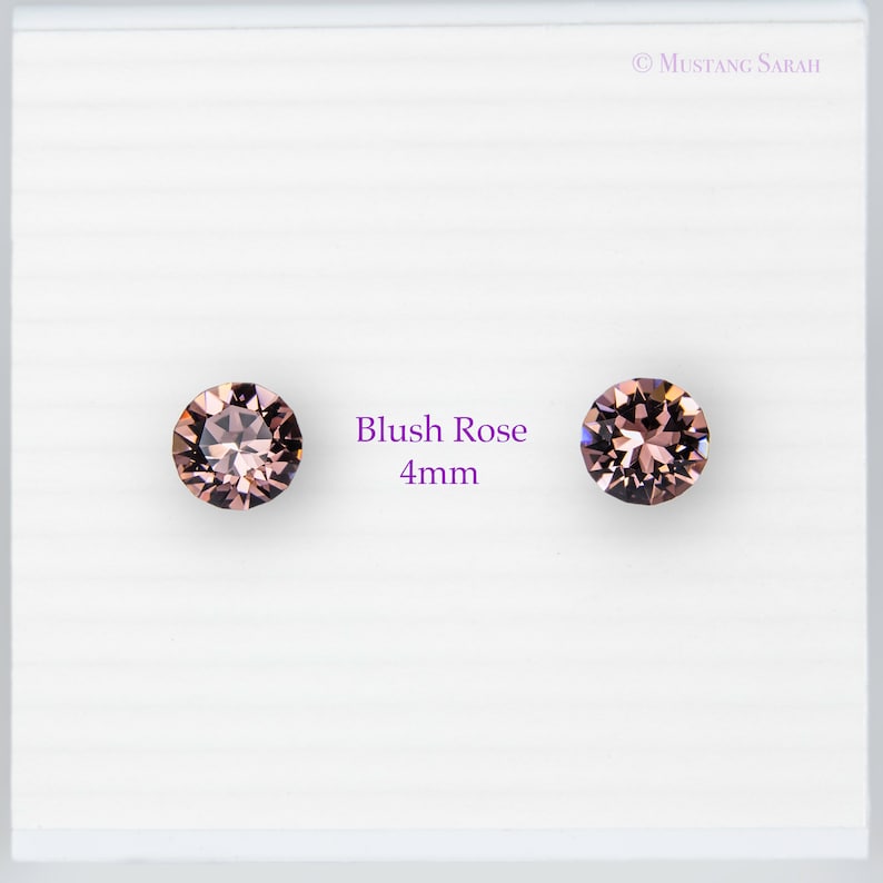 May include: Two blush rose-colored, 4mm round gemstones on a white background. The gemstones are faceted, reflecting light. Text on the image reads "Blush Rose 4mm". The brand name "Mustang Sarah" is in the top right corner.